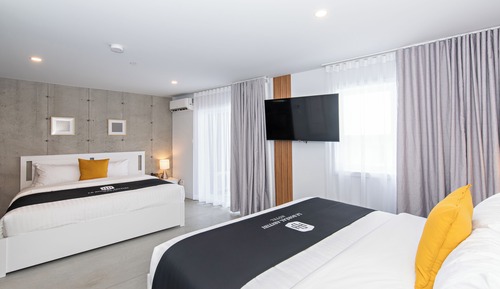 Estudio clásico, varias camas