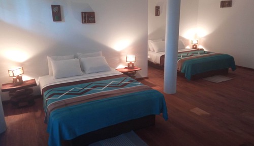 Habitación cuádruple Confort, vistas al jardín