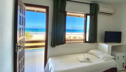 Habitación con 2 camas individuales, balcón, vistas al mar