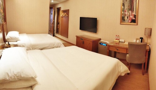 Habitación Business con 1 cama doble o 2 individuales