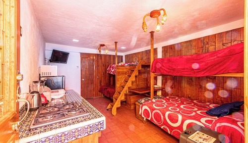 Habitación cuádruple Confort, vistas al jardín