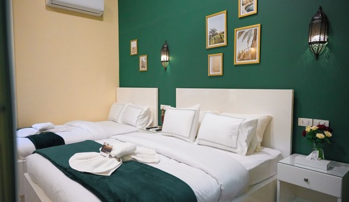 Habitación triple Deluxe, balcón, vistas a la ciudad