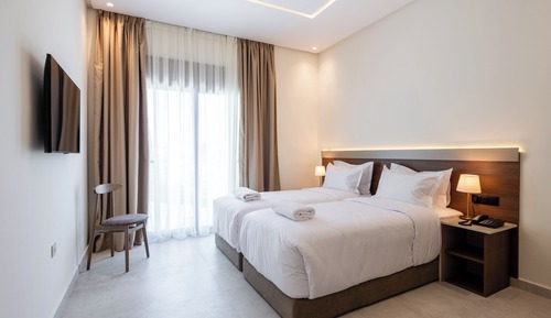 Habitación superior con 1 cama doble o 2 individuales