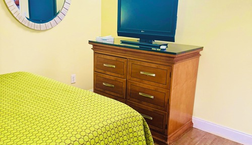 two room suite with 1 Queen Bed, 1 Twin Bed and 1 Sofa Bed