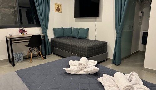 Habitación triple Deluxe