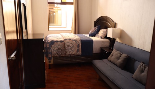 Bungalow Deluxe, patio, vistas al jardín