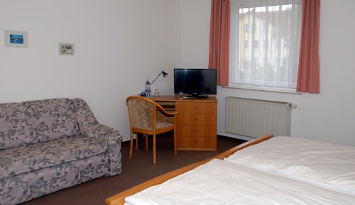 Habitación Business con 1 cama doble o 2 individuales