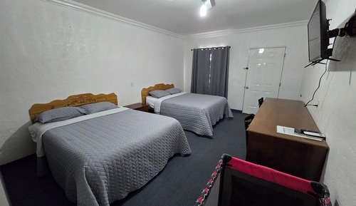 Habitación cuádruple estándar, 2 camas de matrimonio