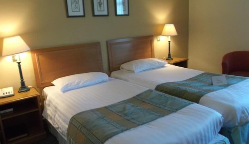 Habitación con 2 camas individuales