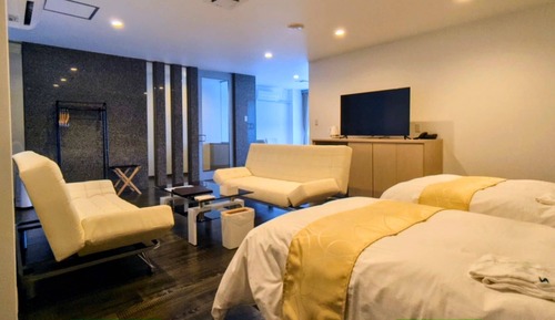 Habitación familiar con 2 camas individuales, 4 habitaciones, fumadores, vistas al mar