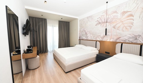 Habitación triple, balcón