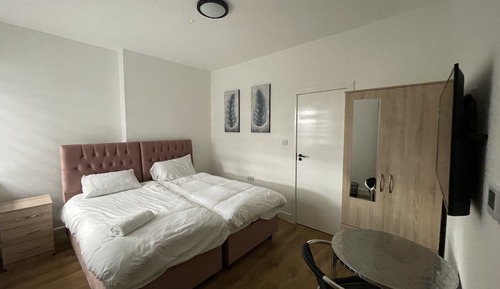 Habitación Elite con 1 cama doble o 2 individuales, baño privado