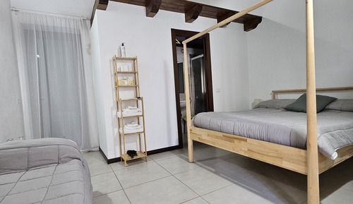 Habitación triple Deluxe, balcón, vistas al patio