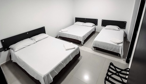 Habitación familiar, varias camas