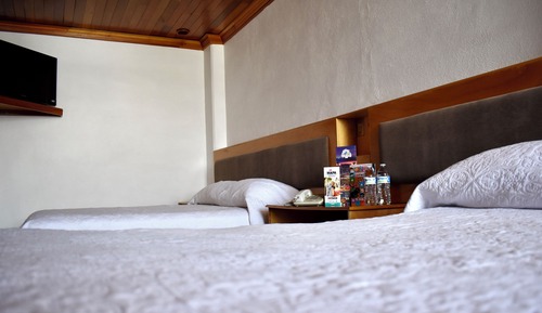 Habitación triple Deluxe, vistas a la ciudad