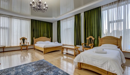 Habitación Deluxe con 1 cama doble o 2 individuales, varias camas