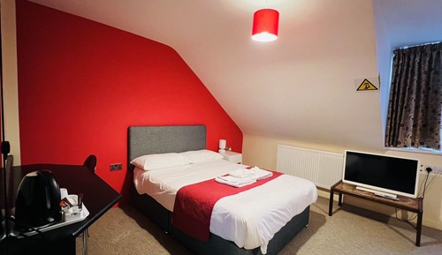 Habitación triple Deluxe