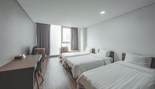 Habitación triple Deluxe