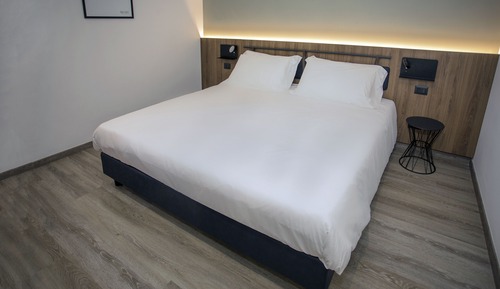 Habitación superior con 1 cama doble o 2 individuales