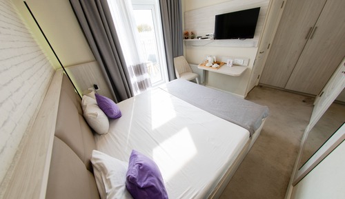 Habitación estándar con 1 cama doble o 2 individuales