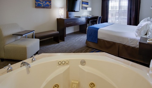 Suite, 1 cama de matrimonio grande, bañera de hidromasaje (Whirlpool)