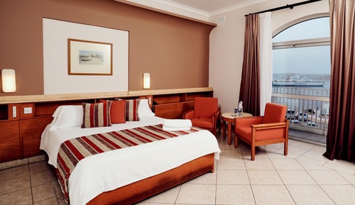 Habitación triple, vistas al mar