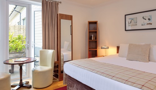 Habitación doble superior, 1 cama de matrimonio grande, patio, vistas al jardín