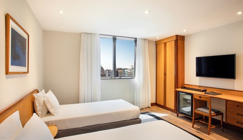 Luxo com 2 Camas de Solteiro