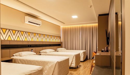 Habitación cuádruple superior, varias camas