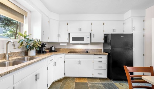 Suite, varias camas, cocina, vistas al río