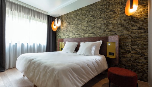 Habitación Signature doble, 1 cama de matrimonio con sofá cama