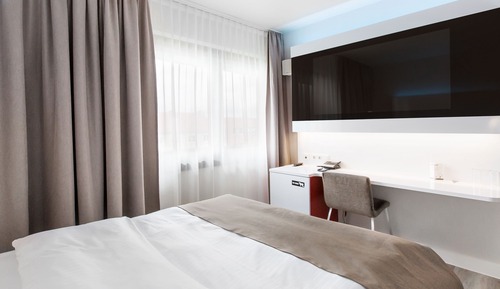 Habitación estándar con 1 cama doble o 2 individuales