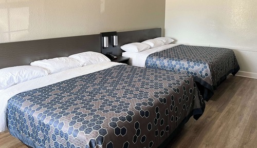 Habitación Deluxe, varias camas, no fumadores, frigorífico y microondas