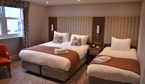 Habitación Premium, varias camas