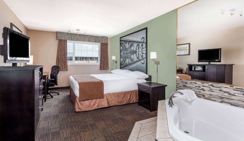 Suite, 1 cama de matrimonio grande, bañera de hidromasaje