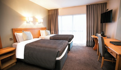 Habitación estándar con 1 cama doble o 2 individuales, varias camas