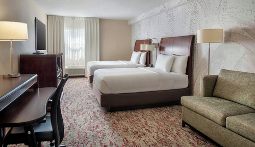 Estudio, varias camas