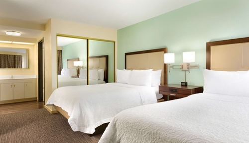 Suite con 2 matrimoniales, cocina