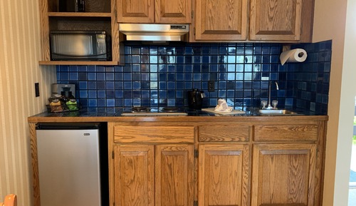 Habitación, varias camas, cocina básica