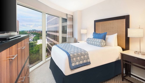 Suite Business, 1 cama de matrimonio, vistas a la ciudad, en esquina