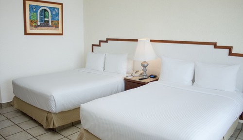 Habitación superior, 2 camas dobles, vistas al mar