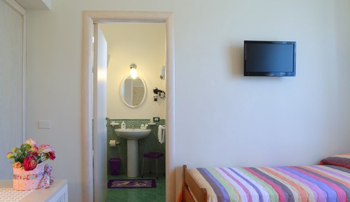 Habitación triple, vistas al jardín