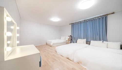 Habitación familiar, varias camas