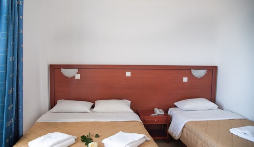 Habitación triple, vistas al mar