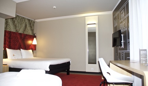 Habitación triple, varias camas