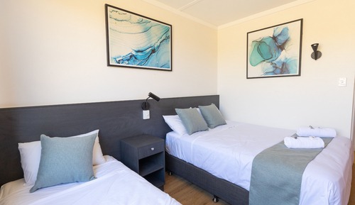 Habitación triple clásica, varias camas, baño privado