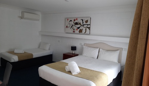 Habitación triple Deluxe, varias camas, no fumadores, cocina