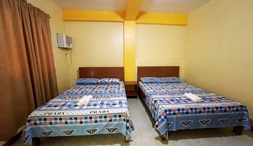 Habitación triple, vistas al mar