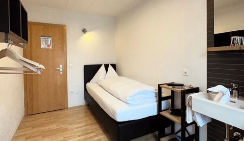 Habitación individual, baño compartido