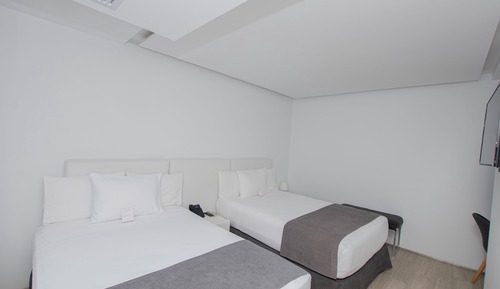 Habitación, 2 camas de matrimonio, vistas al jardín